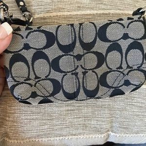 Coach wristlet,  lipstick cash phone and keys